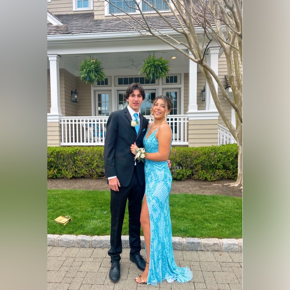 PRIMAVERA COUTURE DRESS 4113
Prom  “powder blue” with beading, slit, open back